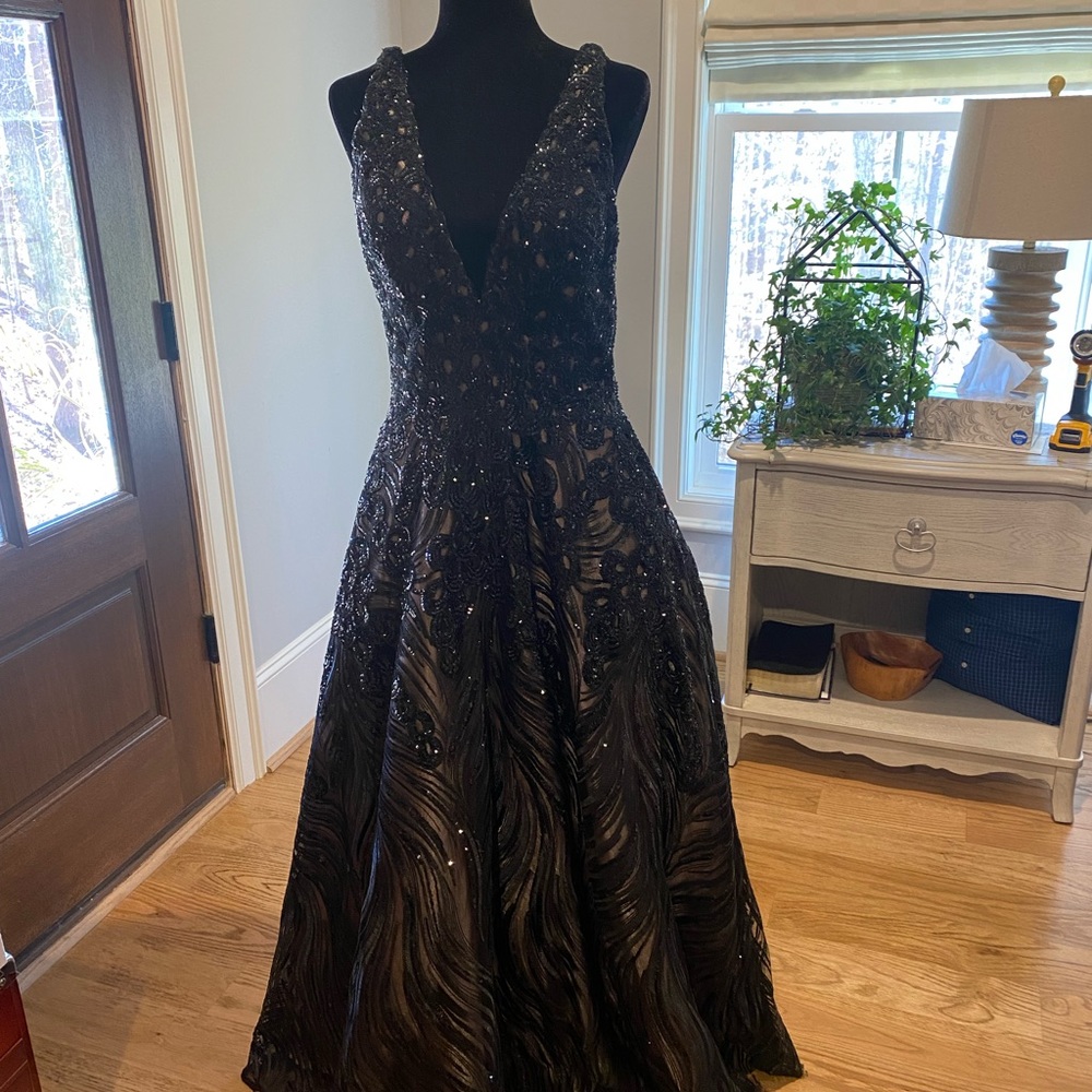 Gorgeous black evening dress. Worn only once for prom. Overlay with sequins.